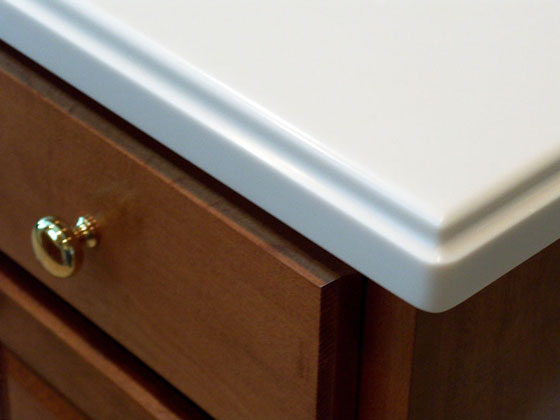 white countertop on a solid maple cabinet